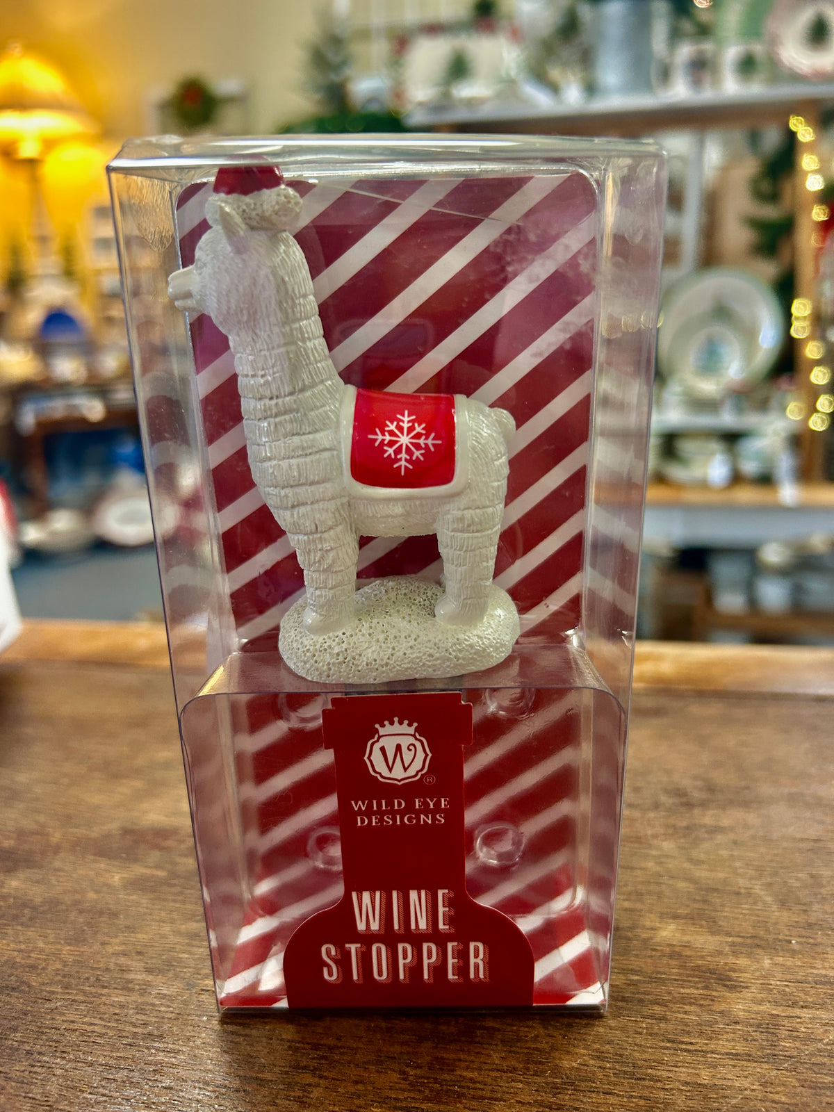Wild Eye Designs wine stopper: white reindeer figure in clear gift box, candy-cane stripes