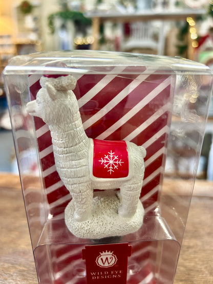 Wild Eye Designs wine stopper with white reindeer holding red snowflake card, candy-cane box