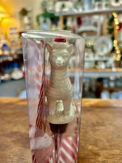 Wild Eye Designs wine stopper: white animal figure inside clear box with red candy-cane sides