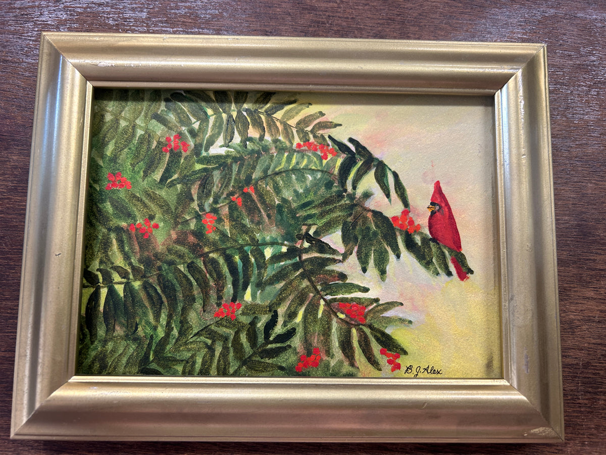 Framed red cardinal signed acrylic artwork with leafy branch design