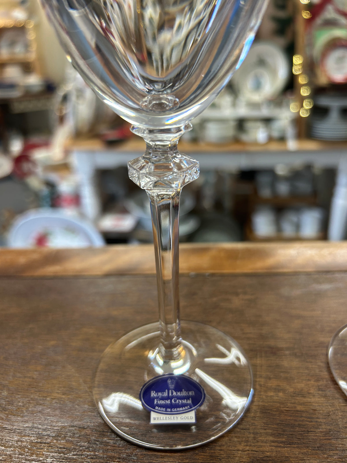 Royal Doulton crystal wine glass with faceted stem and round base label