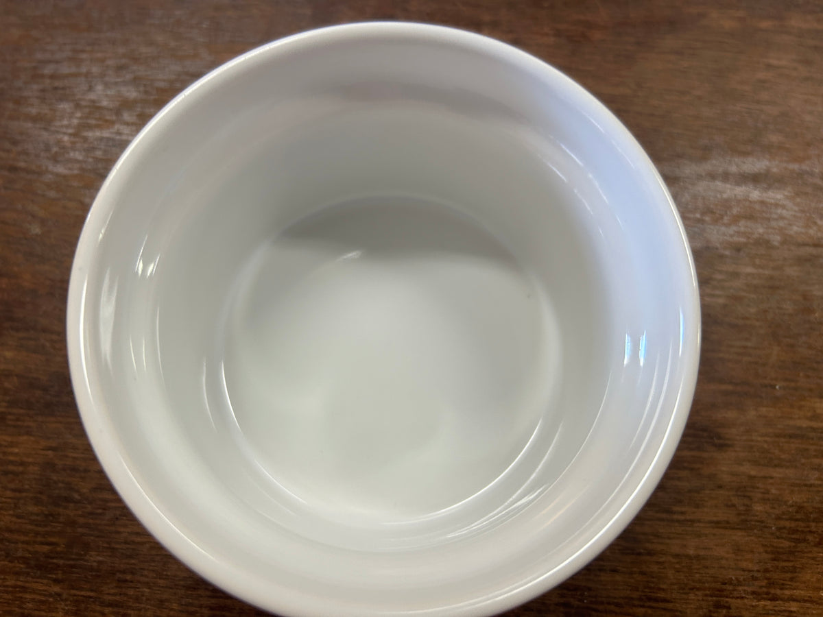 White ceramic bowl inside view with smooth round base