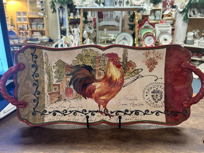 Rooster serving platter with maroon handles and village illustration