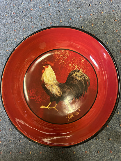 Red rooster bowl with rooster artwork and black outer rim