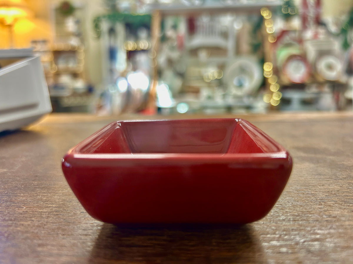 Small red glossy square bowl with angled sides