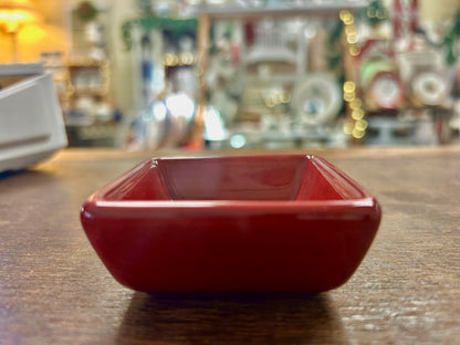 Small red glossy square bowl with angled sides