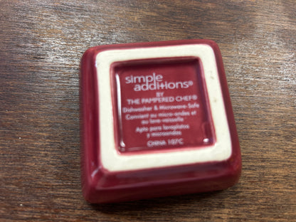 Square red bowl base with Simple Additions and Pampered Chef logo text
