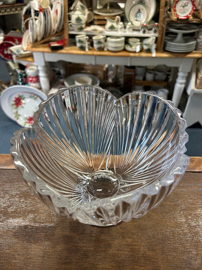 Clear crystal shell bowl with flared scalloped edge and embossed center medallion