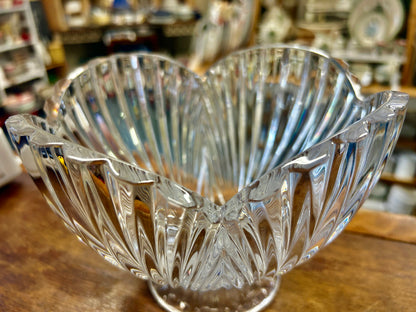 Clear crystal shell bowl with open flared sides and starburst-like ridges